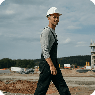 Sunstate Equipment logo over an image of a person walking in a construction site